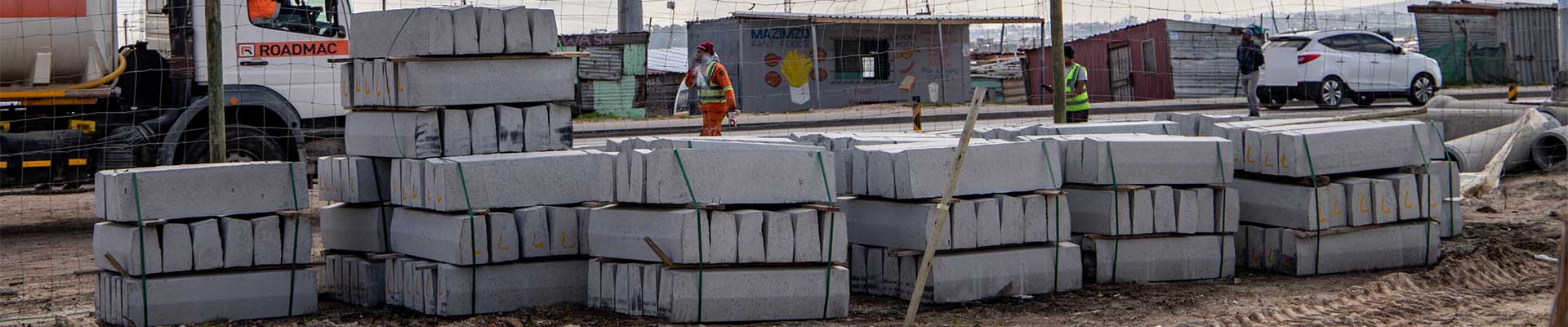 Stacks of precast concrete kerbs at Vuyani Public Transport Interchange for Diges Group